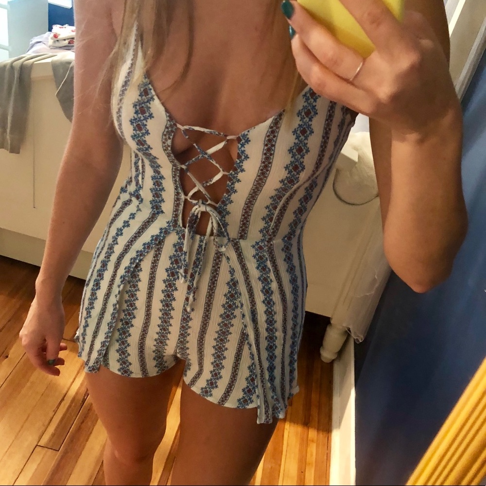 LF lace up romper with blue and orange design